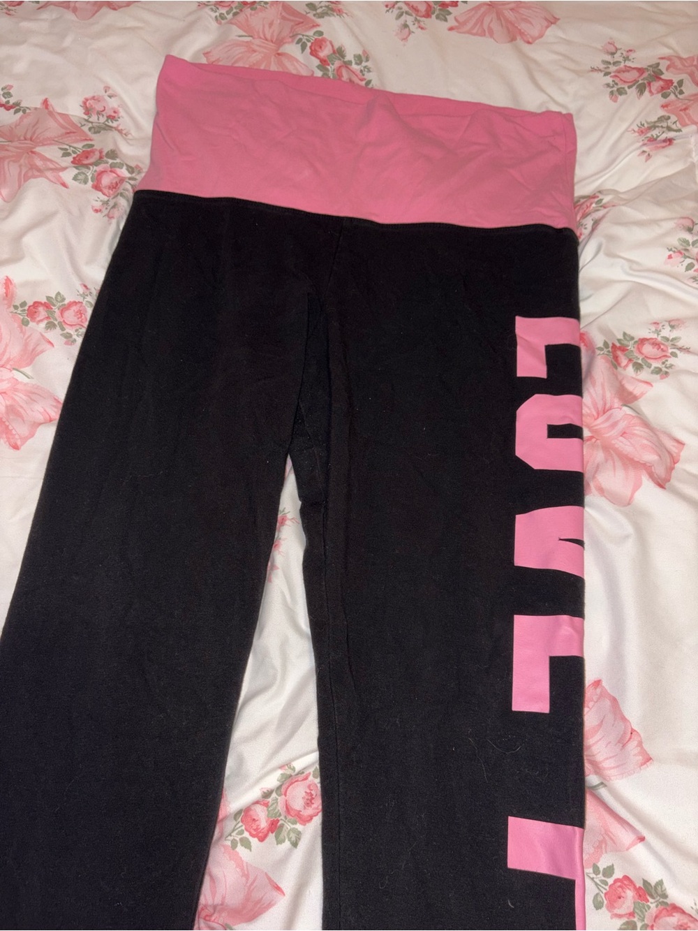 Woman’s Black and Pink Fold-Over Waistband Yoga Pants